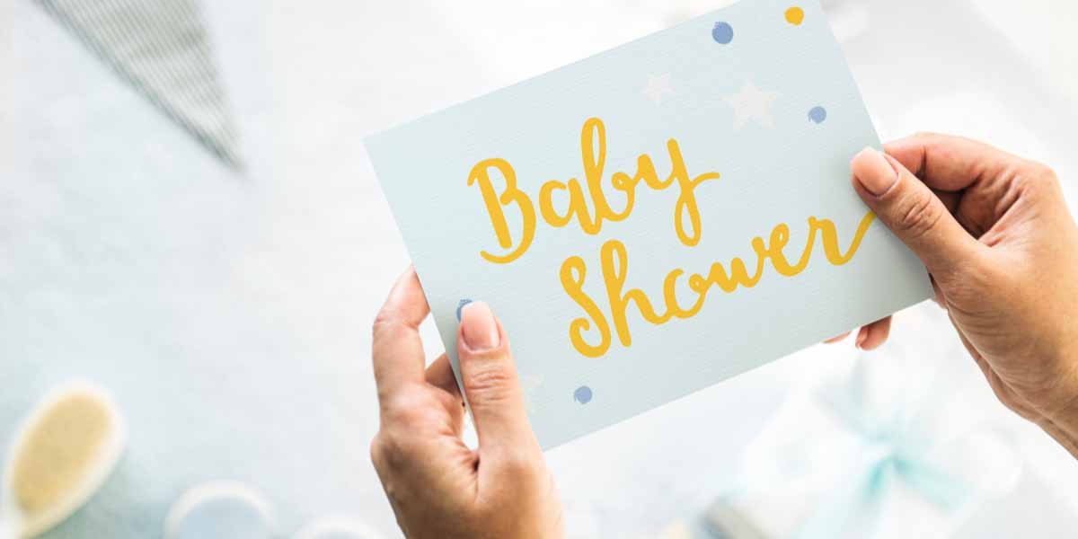A baby shower announcement card.